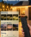 Hand holding remote in front of patio lit by 50Ft Solar String Lights Outdoor Dimmable Patio Lights with 3 light modes visible