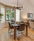 Black Sputnik Chandelier With 6 Lights, modern industrial ceiling light above dining table in stylish room with contemporary decor