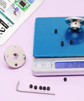 4 Piece 8mm Rigid Flange Shaft Coupling Kit With Set Screws And Included Wrench showcasing components on a digital scale