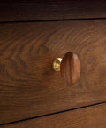 Kick Up Your Home Decor Game With Four Slick Bronze And Walnut Wood Cabinet Knobs Featuring Tight Vintage Style Brass Drawer Pulls For Kitchen And Dresser Cabinets. Close-up view of a walnut wood cabinet knob with a brass base.