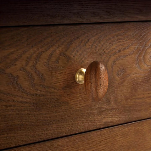 Kick Up Your Home Decor Game With Four Slick Bronze And Walnut Wood Cabinet Knobs Featuring Tight Vintage Style Brass Drawer Pulls For Kitchen And Dresser Cabinets. Close-up view of a walnut wood cabinet knob with a brass base.