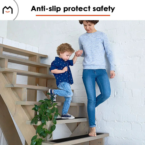 Non Slip Stair Treads For Wood Steps Peel And Stick 8x30 Inch Runner Rug Black 15 Pack in use with child and adult on stairs