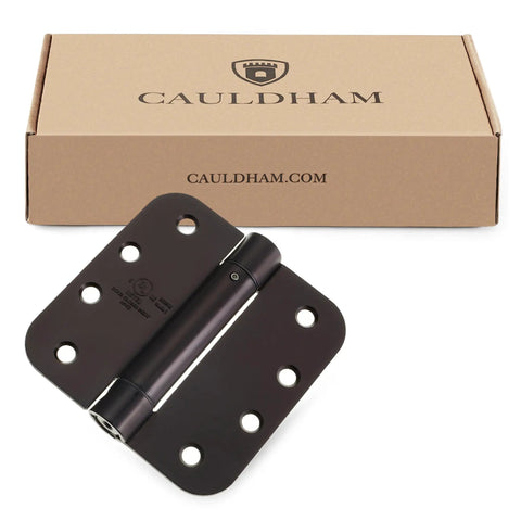 Heavy Duty 4 Inch Self Closing Spring Door Hinges Two Pack With Adjustable Closing Power And Oil Rubbed Bronze Finish on box.
