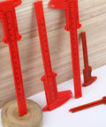 Depth Vernier Caliper Micrometer Gauge Measuring Tool, Multifunctional Depth Caliper for Measuring Length Tool Digital Gauge Vernier displayed in red on a wooden surface.