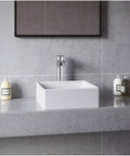 Quattro QM174 Vibrant Matte White 15 Inch Square Bathroom Vessel Sink For Above-Counter Installation on gray countertop