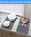 Silicone Kitchen Sink Mat Protector Grid For 12 To 30 Inch Sinks Non Slip Raised Feet Cushioned Protection Gray 26x14 Center with dishes
