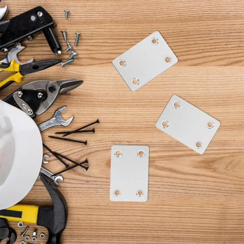 Stainless Steel Flat Corner Bracket Set 30 Pcs With 19mm And 42mm Hole Spacing on wood surface with tools and screws
