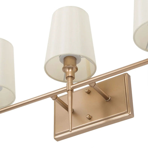 Three Light Gold Vanity Light Fixture With White Fabric Shade For Modern Bathroom, 23 Inch Length, 6.5 Inch Width, close-up view