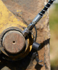 Heavy Duty 14 Oz Pistol Grip Grease Gun Kit With 7000 Psi Two Hoses Pro Grade Reinforced Coupler and Nozzle on machinery