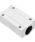 Aluminum 70mm linear bearing slide block for 12mm shaft with mounting holes (angled view)