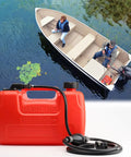 3 Gallon Portable Boat Fuel Tank With Hose And Gauge 12L Transfer Tank for Outboard Motors, red, next to small fishing boat.