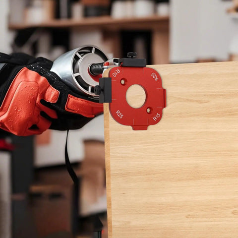 Heavy Duty Aluminum Router Corner Radius Template Kit Including Eight Radius Measurement Options For Butter Smooth Woodworking Edge Profiling And Router Table Jig Setup That Guarantees Zero Headaches. Red jig attached to wood edge with drill.