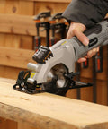 Inequalit mini circular saw, corded gray compact tool with laser guide and 4-1/2-inch blade.