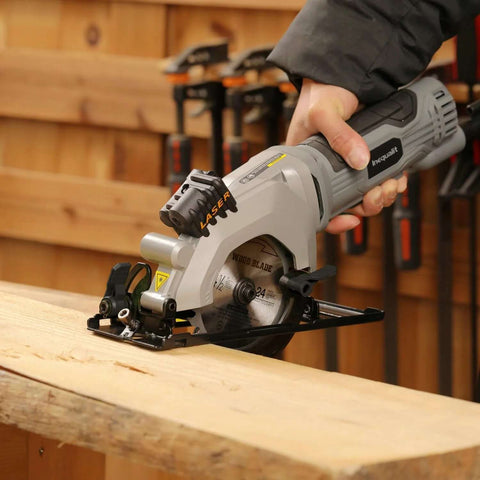 Inequalit mini circular saw, corded gray compact tool with laser guide and 4-1/2-inch blade.
