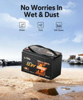 Trolling Motor LiFePO4 Battery 12V 100Ah with Bluetooth Monitoring on sandy beach near water
