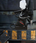 S&F Stead & Fast magnetic drill press kit, 1100W portable with coolant bottle mounted on a magnetic base.