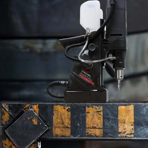 S&F Stead & Fast magnetic drill press kit, 1100W portable with coolant bottle mounted on a magnetic base.