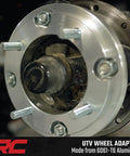 Close-up of heavy duty UTV wheel adapter made from 6061-T6 aluminum, part of upgrade for Polaris UTV setup with 4x156 to 4x136 pattern.