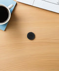 Universal Binding Pad And Gasket Set component on wooden desk near keyboard and coffee