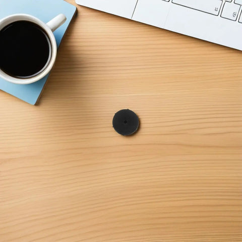 Universal Binding Pad And Gasket Set component on wooden desk near keyboard and coffee