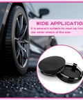 Pack Of Four Black Car Wheel Center Hubcaps Rock Solid Abs Plastic Snap On Rim Covers Universal Fit displayed with sleek tire background.