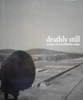 Alt Tag: Cover of 'Deathly Still Photographs From Concentration Camps A Raw Unflinching First Edition Photo Journal By Dirk Reinartz.'