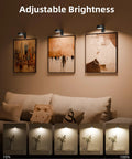 EZVALO three-pack picture lights mounted above framed artwork on wall.