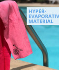Chilly Pad Cooling Towel For Sports And Outdoors, Hyper Evaporative, pink towel by poolside, 33 by 13 inches, sun protection.