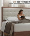 Top Shelf King Bed Frame Crafted From Solid Hardwood With A Fifty Inch Tall Tufted Linen Headboard And Rich Walnut Finish, woman reading in bed.