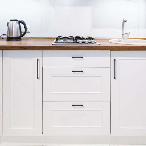 Heavy Duty Matte Black Kitchen Cabinet Pulls And Drawer Handles With 3.5 Inch Center To Center Spacing Top Shelf Zinc Alloy Hardware Slick Modern Finish 10 Pack on white kitchen cabinets.