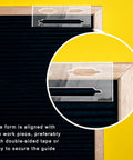 Slick Clear Acrylic Keyhole Slot Routing Template For Hanging Picture Frames And Woodworking Projects aligned with a wooden frame.
