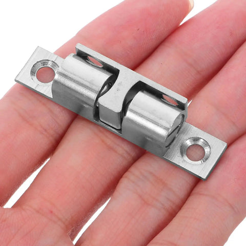 Copper Ball Door Catch Cabinet Latch Hardware Set 50mm Silver Roller Catch 4 Pack displayed on a hand