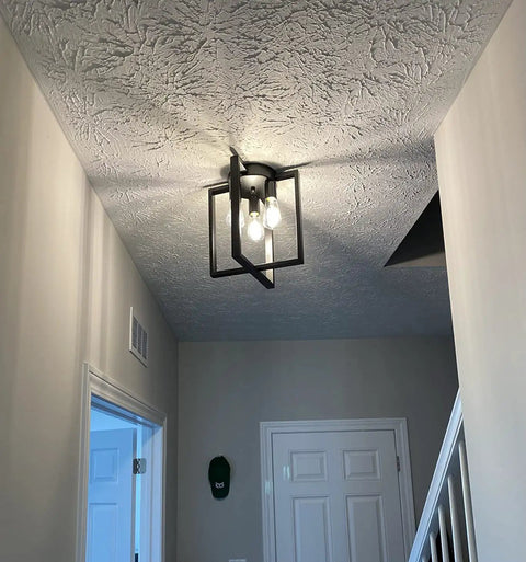 Vintage Square Black Ceiling Light Fixture 3 Light Industrial Farmhouse Modern Geometric Metal Ceiling Lamp With Retro Vibe installed in hallway