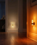 Plug In Night Lights 4 Pack With Dusk To Dawn Sensor Kid Friendly 8 Color RGB LED Color Changing Night Light illuminating hallway
