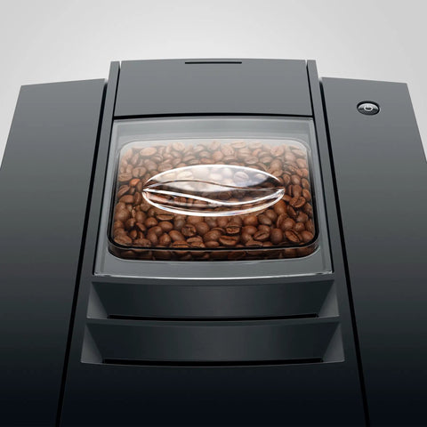 Fully Automatic Chrome Espresso Machine One Touch Custom Barista Brewer Fresh Bean Grinder Premium Coffee Maker Top Shelf Brewmaster smooth view of coffee beans in grinder compartment.