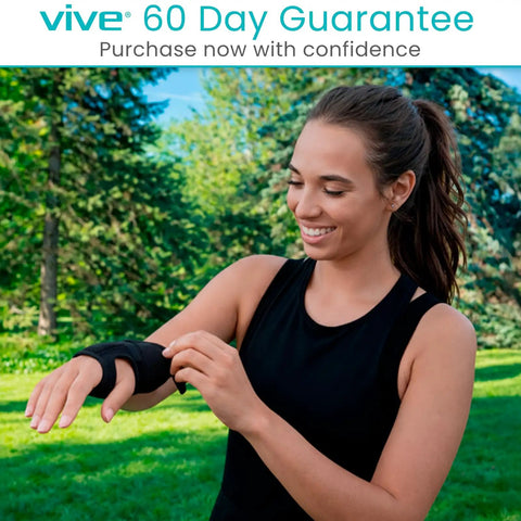 Woman outdoors wearing black top adjusts Carpal Tunnel Wrist Brace With Splint For Left Or Right Hand Adjustable Night Support Immobilizer