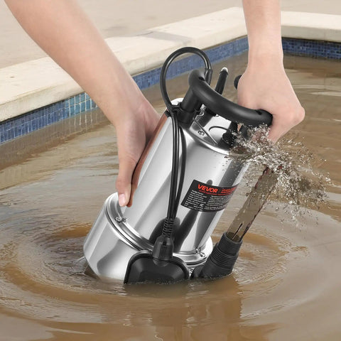 Person using 1 HP Submersible Sump Pump With 5500 GPH Flow Stainless Steel Build Automatic Float Switch Long Cord 30 Ft Lift in muddy water