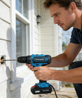 Man using Heavy Duty 21V Brushless Cordless Drill Set With Badass Torque Two Speed Modes to drill into concrete wall.