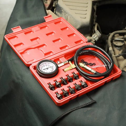 Oil pressure tester tool kit with 0–140 PSI gauge, red case, hoses and assorted brass adapters