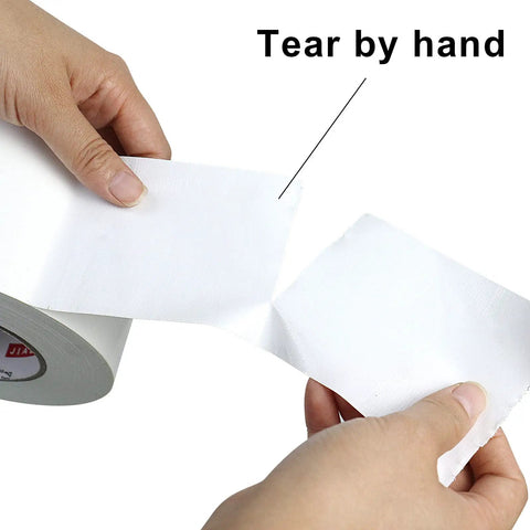 White Duct Tape 3 Inch Wide, Heavy Duty Industrial Grade 55 Yards, Waterproof And UV Resistant being torn by hand