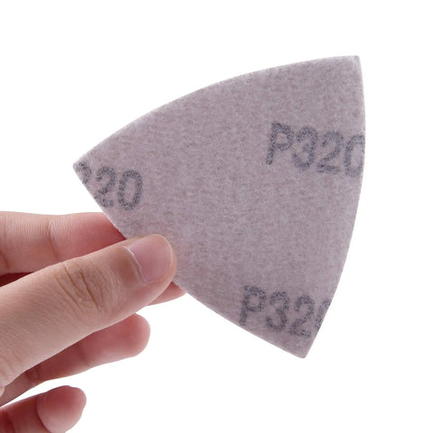 Close-up of Triangular Sandpaper Set for Oscillating Multi Tool sheet, 320 grit, 3-1/8 inch, hook and loop backing, no holes.