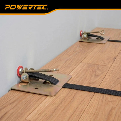 Wood Flooring Strap Clamp For Quick No Mess Installation Of Laminate Tongue And Groove And Hardwood Floors With A 13ft Nylon Strap 220 Lbs Clamping Force Durable Metal Build Built Tough in use on wooden floor.