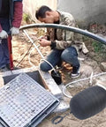 Compact Portable Inflatable Pipe Plug For Quick Leak Sealing In PVC Drainage Lines 16.5 By 20.5 Inches being used in sewer