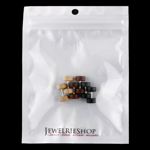 Natural Wood Fake Plugs Cheater Earrings 8 To 10mm 17G in a sealed bag with stainless steel stud backing, hypoallergenic alloy.