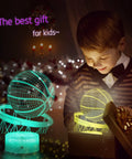 Boy admiring Basketball 3D Illusion Night Light with 16 Color Dimmable LEDs as a gift, placed on desk.