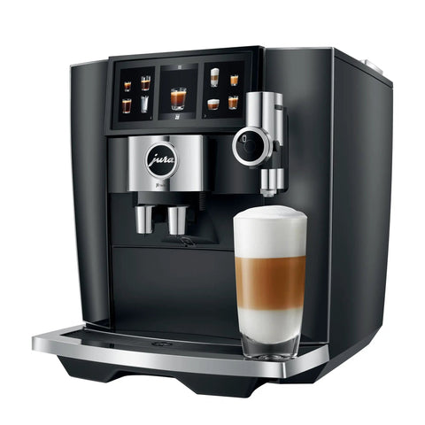 Hella Smooth Super Automatic Bean To Cup Coffee Maker Featuring Integrated Twin Boiler And Sweet Foam Dispenser Setup Plus Huge Angled Touchscreen Panel For A Slick Kitchen Flex On Demand with glass of latte