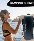 Person using Foldable 12L Solar Heated Camping Shower Kit With Removable Hose And Showerhead For Beach Trips Hiking Travel And Outdoor Adventures Eco Friendly Hot Water On The Go