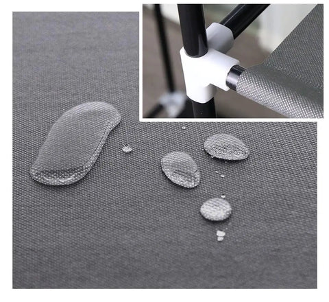 Close-up of water-resistant fabric and frame detail of Grab And Go Portable Wardrobe Closet 50 Inch With Hanging Rods And Nonwoven Fabric Cover Dustproof Space Saving Clothes Organizer In Grey For Quick Access And Easy Assembly