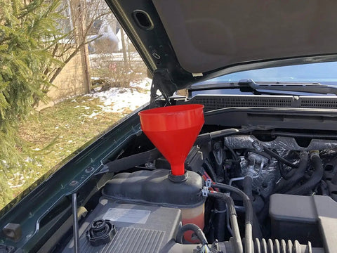 Polyethylene Plastic Funnel With Screen And Hanging Tab, 2 Quart Capacity, in use in car engine bay, ideal for fluids and oils