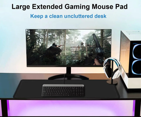 Extra Large Gaming Mouse Pad With Stitched Edges, Premium Microfiber Surface, Waterproof Non Slip Desk Mat 31.5 By 11.8 Inches For Home Office And Gaming Setup, Keyboard, Mouse, Laptop, And More, Black on a desk with keyboard and monitor